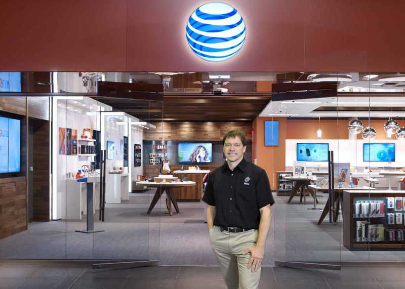 AT&T staff photo against storefront New York Green Screen Photography corporate head shots against green screen