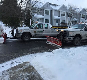 snow plowing 2 trucks
