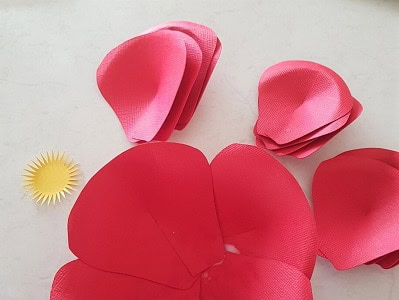 Paper flower petals glued around the circle