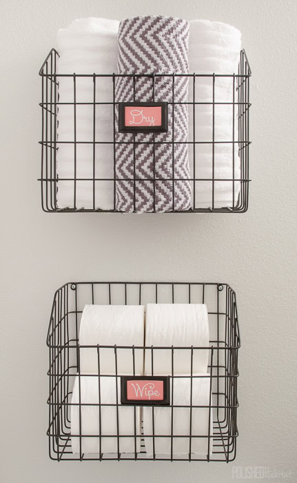 wire basket storage ideas for the bathroom-mount wire baskets on wall and use them to store towels and toilet paper
