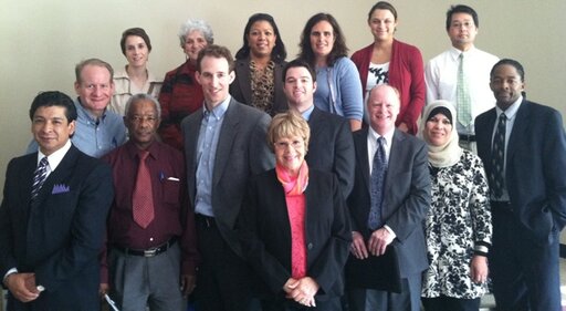 Lynn Coalition Immigrant Learning Center Director of The ILC Public Education Institute Dr. Marcia Drew Hohn, center-front, with participants and facilitators at a workshop on small-business advertising on October 24, 2012, at the Evangelistic Church in Lynn, MA. Photo courtesy Juan-Carlos Ferrufino