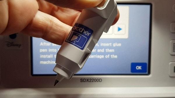 Demonstrating the Brother Foil kit pen inserted into the foil kit holder ready to make the foil card