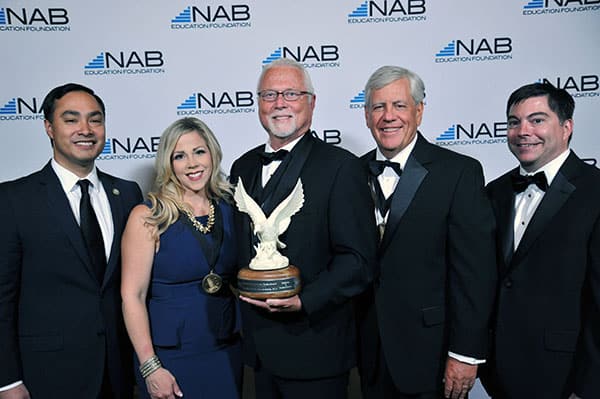 Washington dc awards photography A participant receives a lifetime achievement award from the National Association of Broadcasters during this Washington, DC awards photography event.
