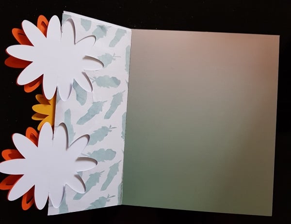 Inside of the 3D flower tri-fold card with patterned paper to embellish it.