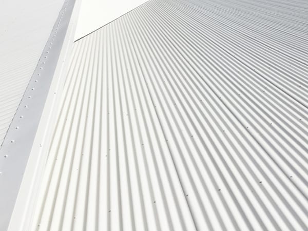 Why Do So Many Australians Choose Corrugated Iron for Their Roofs? Grey Metal sheets Roofing are installed on the steel structure