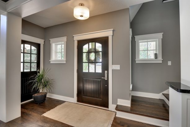 traditional entryway with Sherwin-Williams pavestone SW 7642 wall paint color