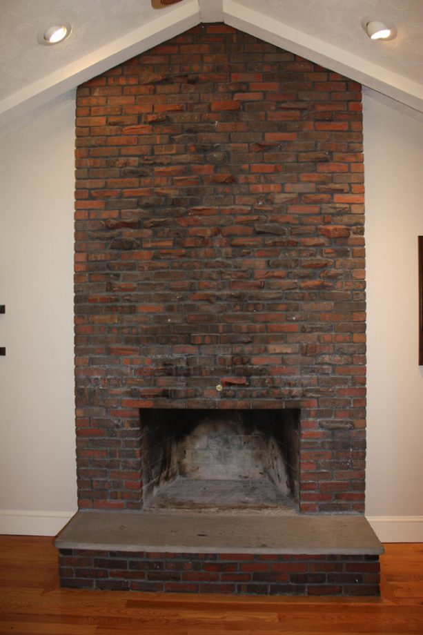 before makeover traditional floor to ceiling brick fireplace no insert