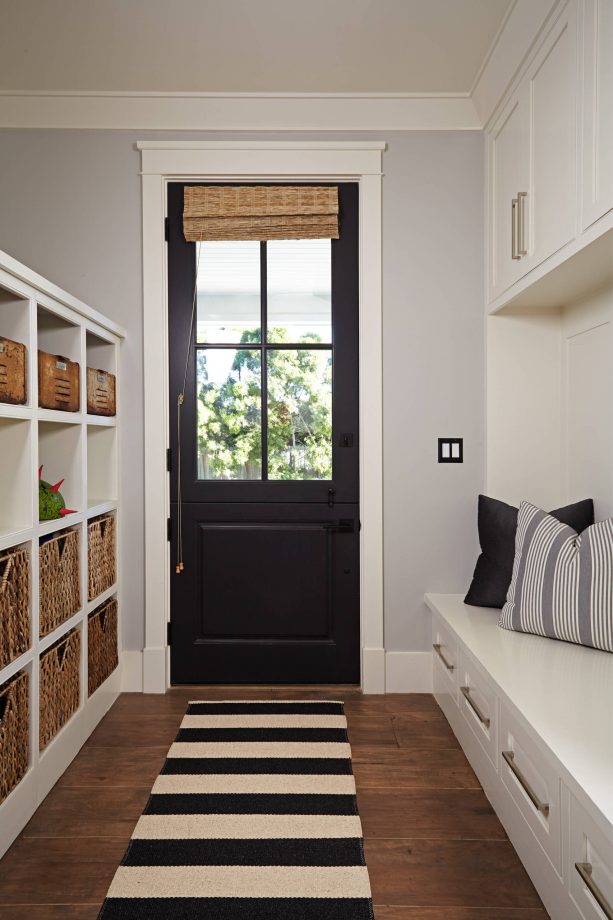 transitional entry with black door and white trim paint color