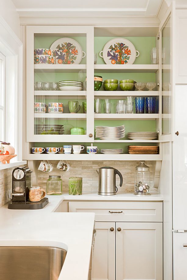 cabinets with soft green inner and glass doors