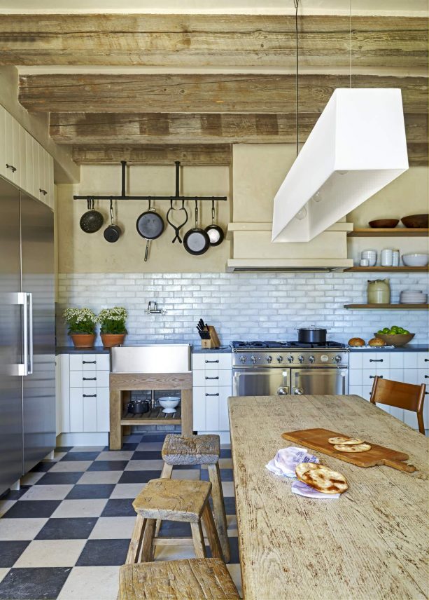limestone and granite tile floor in a farmhouse kitchen interior