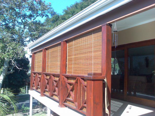 the use of roll-up bamboo blinds outside glass door and windows