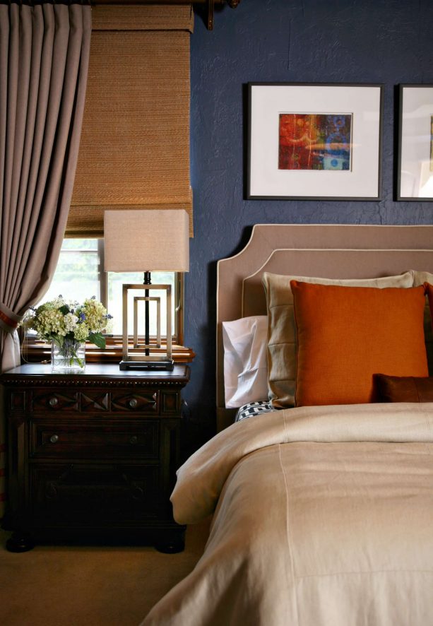 matte blue wall and oat tan curtain in a contemporary bedroom