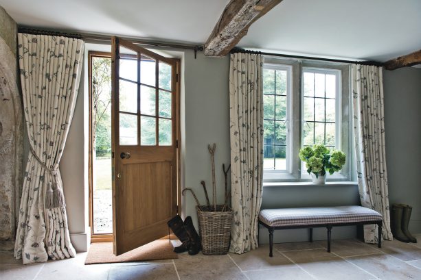 beige floral floor-length curtain with tassel tier
