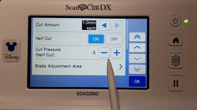 Use the plus and minus to increase and reduce the Half Cut pressure on the Scan N Cut