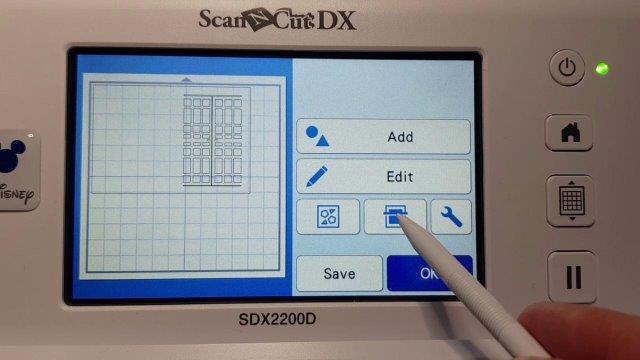 Select the Scan Mat button to scan the materials placed on your Scan N Cut mat for design placement