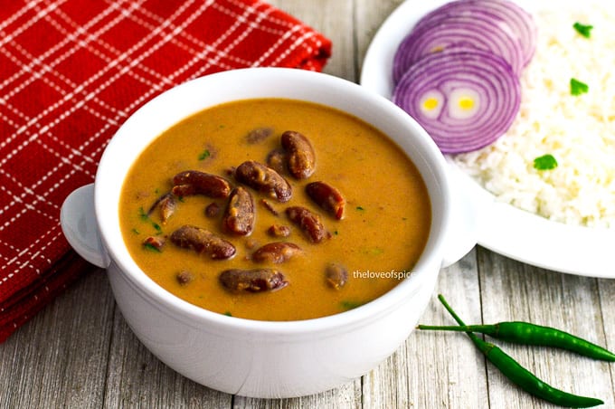 bowl of rajma and plate of rice