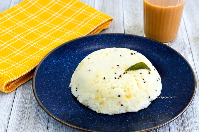 plate of upma and glass of tea