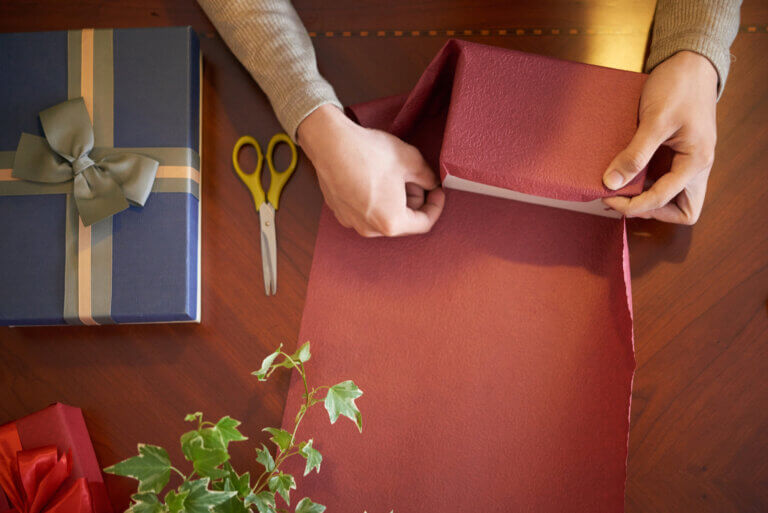 Person wrapping gifts