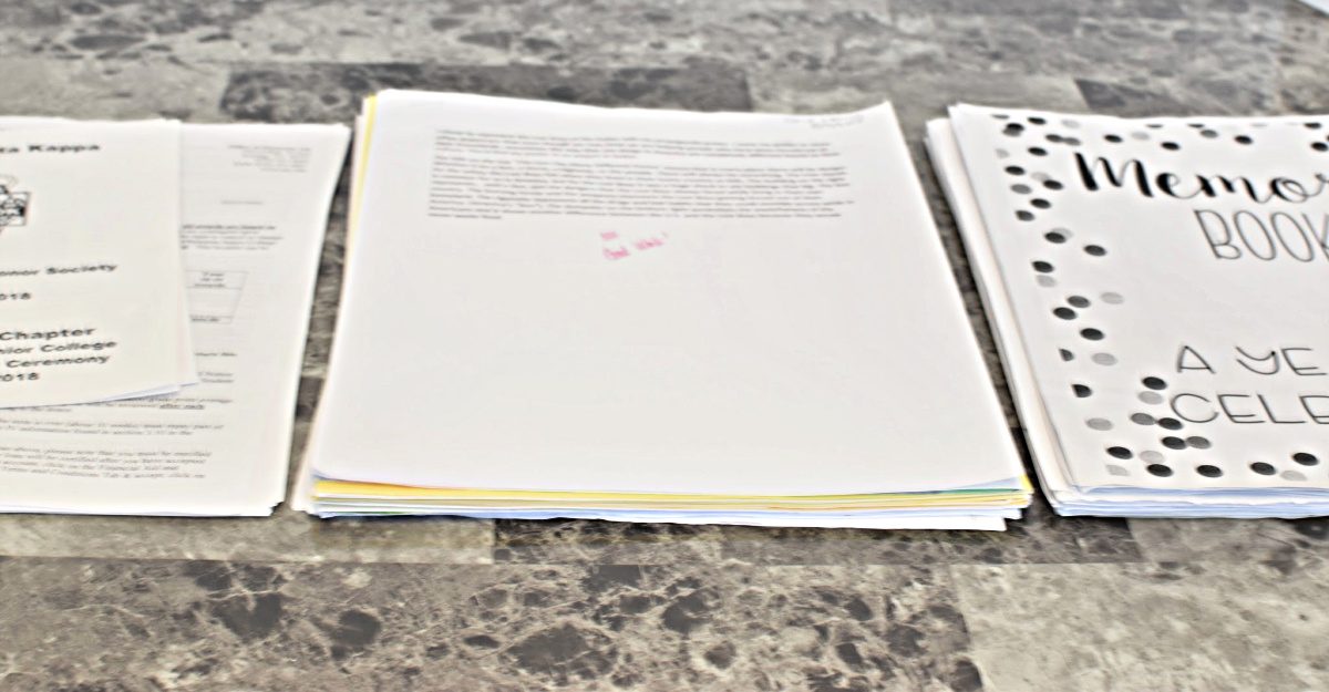 organize kids school papers-stacks of school papers