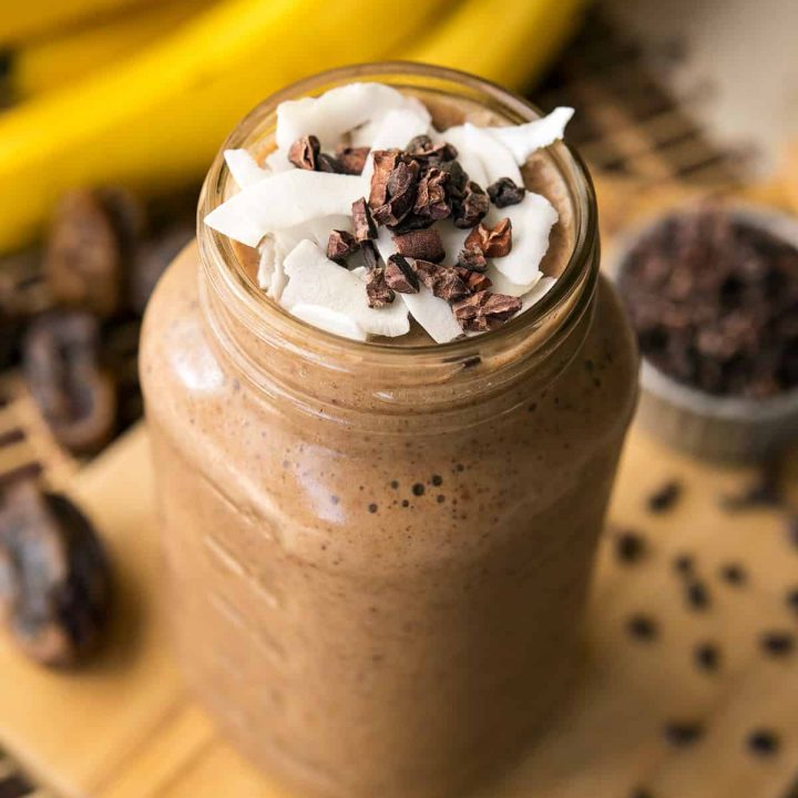 A delicious, naturally-sweetened, and healthy banana cacao recovery smoothie for helping you post-workout or after a rough night out.