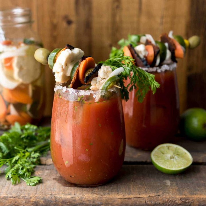 Loaded Chipotle Bloody Mary! Full of flavor from fresh cilantro, lime, homemade escabeche and #vegan bacon. #fathersday #craftyourcocktail