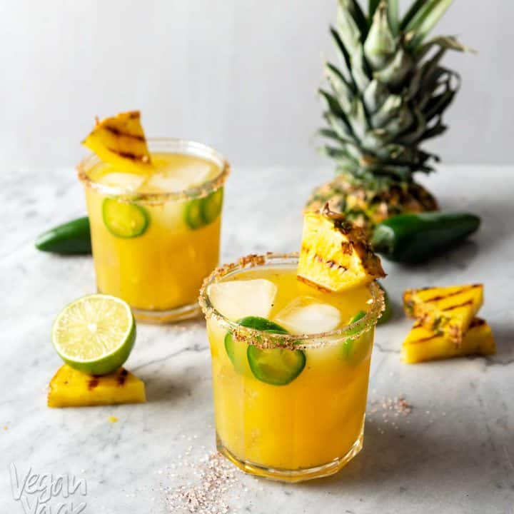 These Charred Pineapple Jalapeño Margaritas are better than any of their predecessors and unique in their own way! Try out this recipe to cool down, while also bringing the heat. #cocktails #margaritas #pineapple #recipe #jalapeno