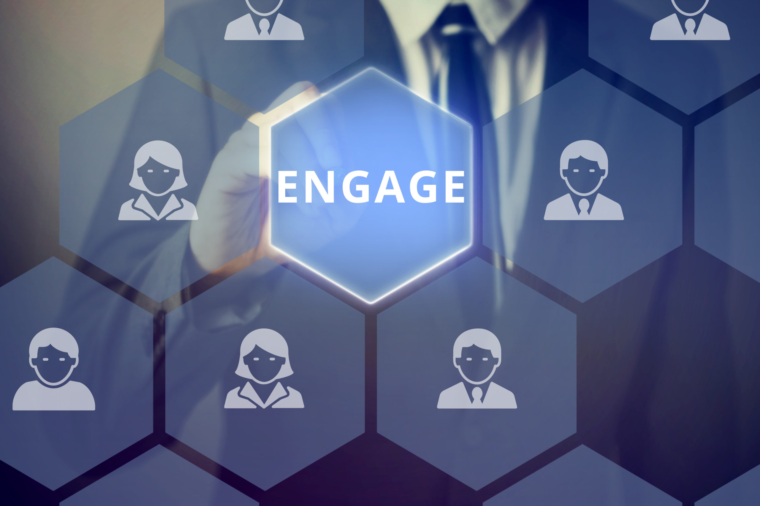 Businessman touching ‘ENGAGE’ word on virtual screen Customer Engagement Altruas