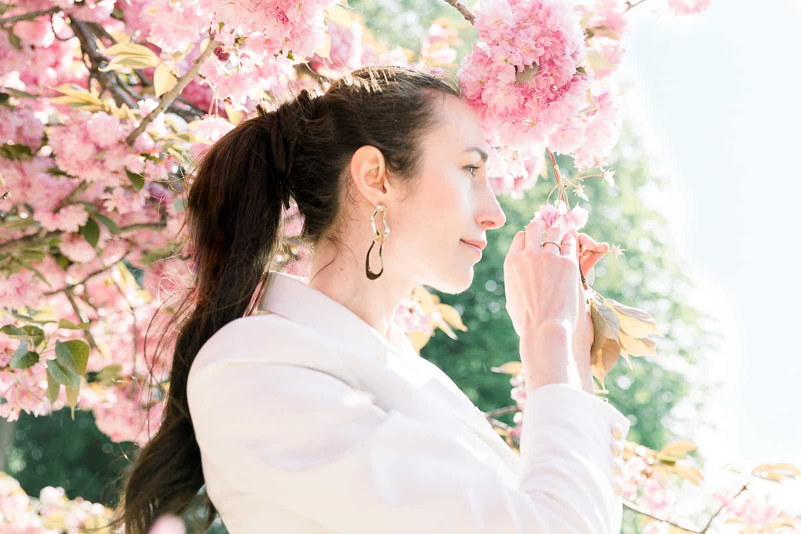 Bride with cherry blossoms in Paris, France near Notre Dame
