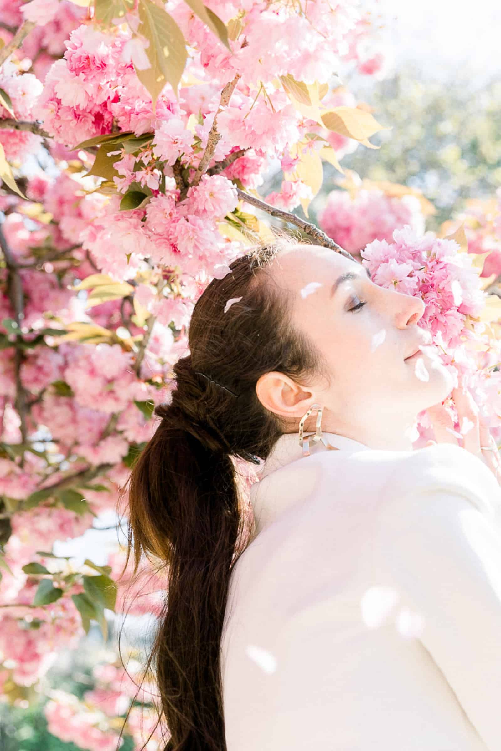 Bride with cherry blossoms in Paris, France near Notre Dame