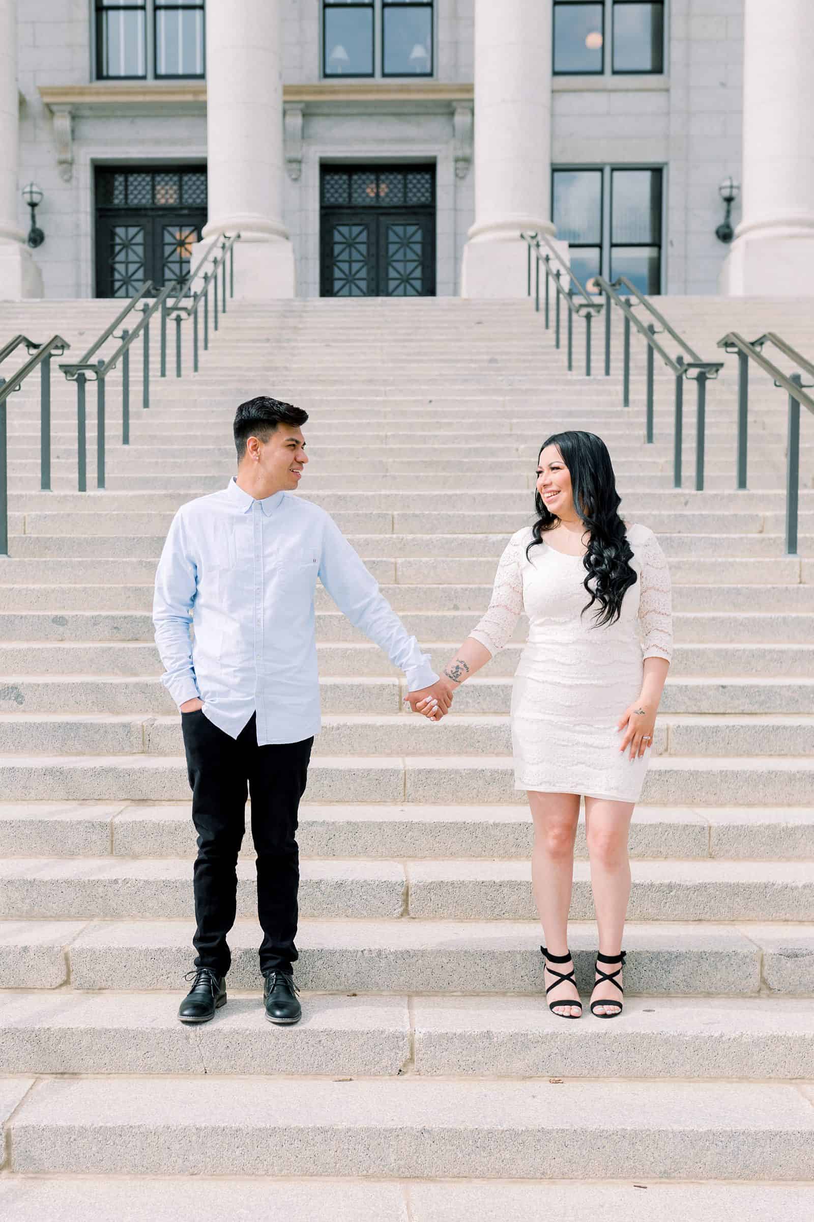 Classy engagement photos at the Utah State Capitol Building in downtown Salt Lake City, outfit for engagement pictures, short white lace dress and light blue button up shirt