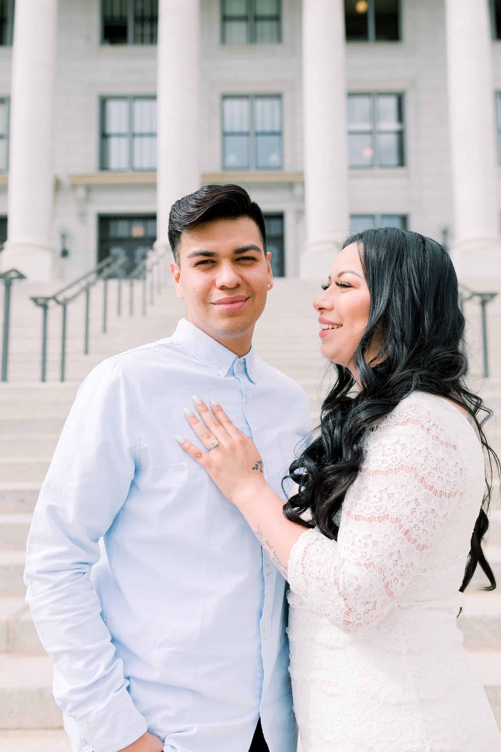 Classy engagement photos at the Utah State Capitol Building in downtown Salt Lake City, outfit for engagement pictures, short white lace dress and light blue button up shirt