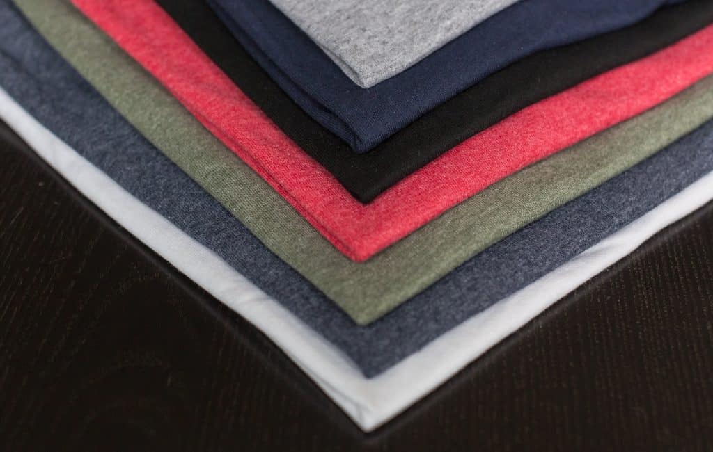 sell t-shirts - stack-of-t-shirts