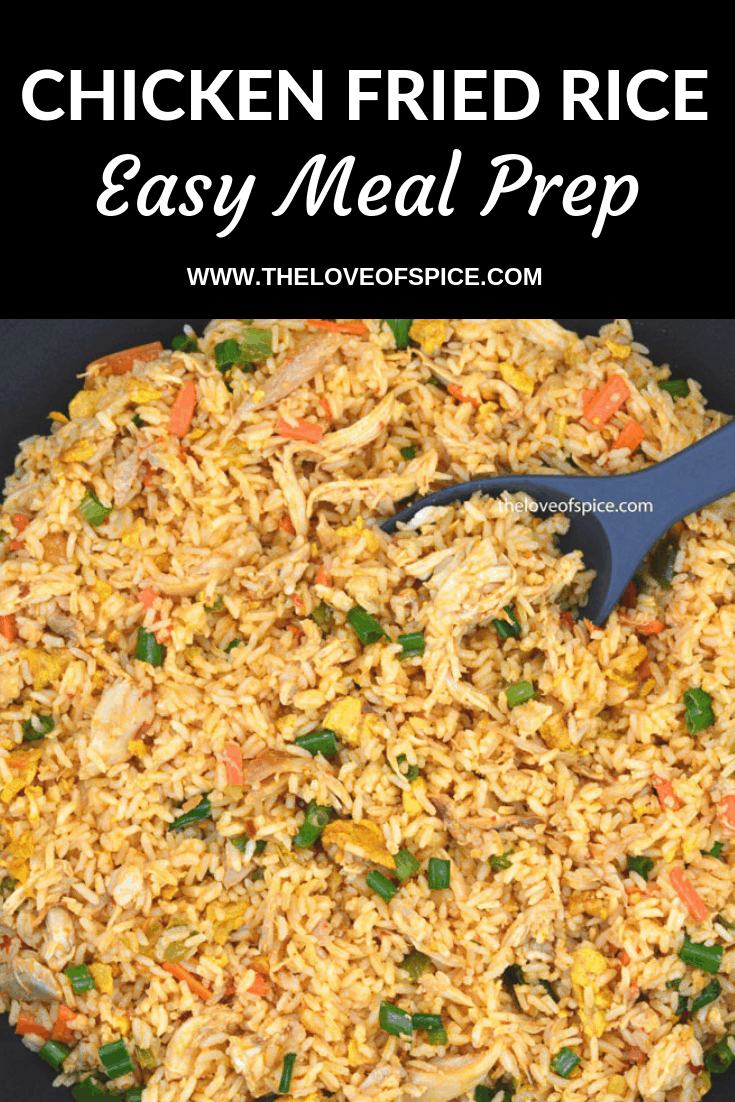 chicken fried rice in a black wok