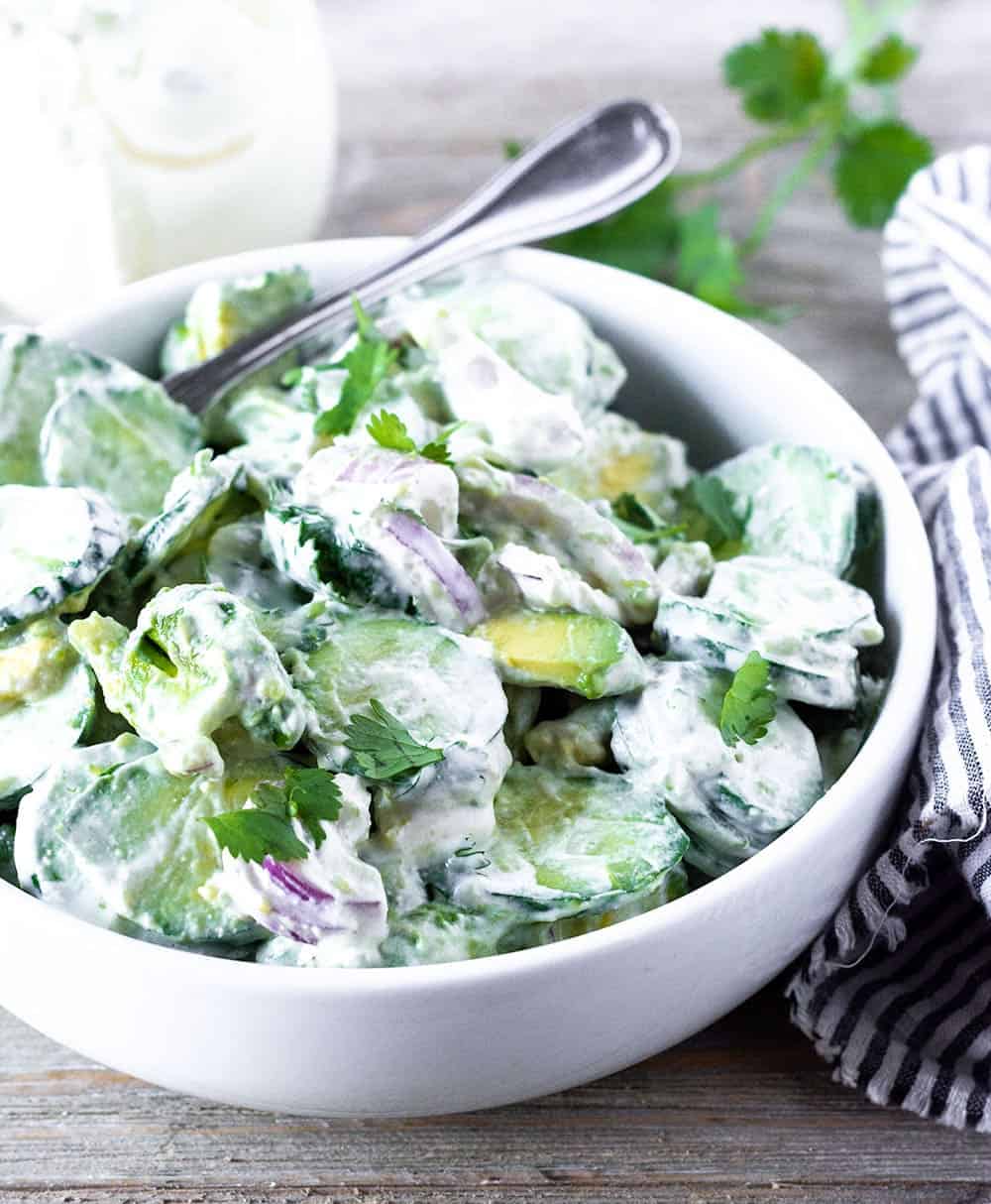 Cucumber avocado salad in a bowl,