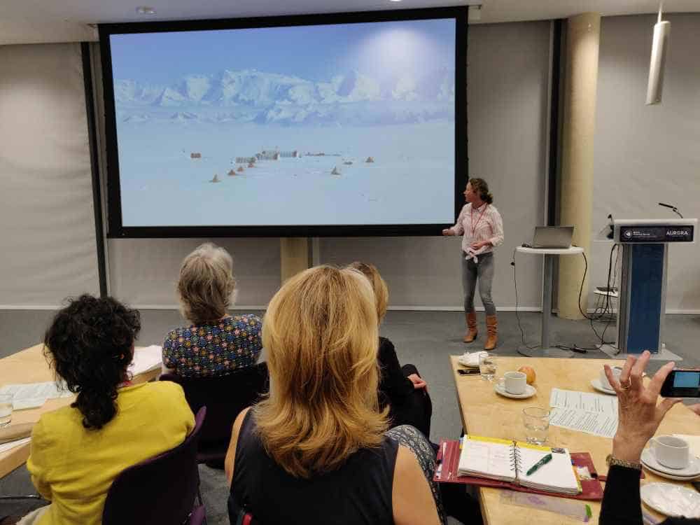 A photo of Louise Sime talking about drilling ice cores