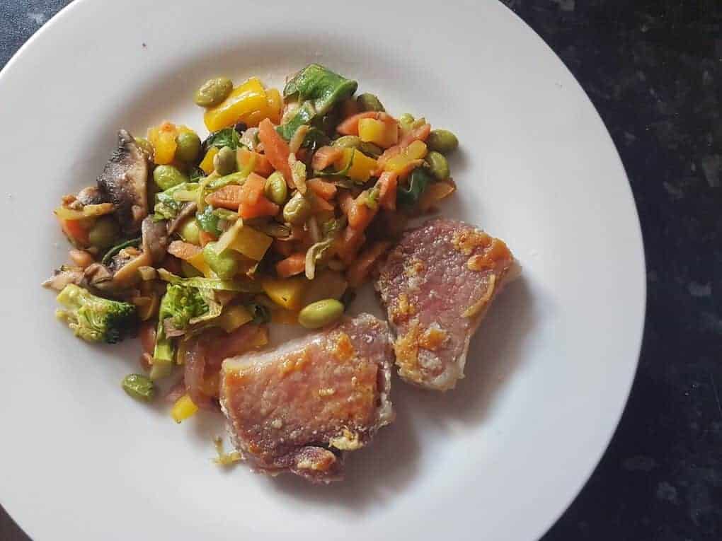 Pork chop with edemame stir fry vegetables Pork chop with edemame stir fry vegetables