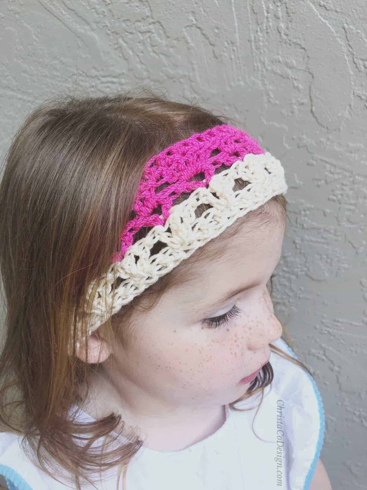 picture of girl in pink and cream in crochet summer headband