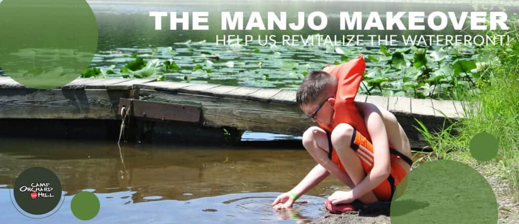 ManjoMakeoverWeb Boy in life vest playing in the lake