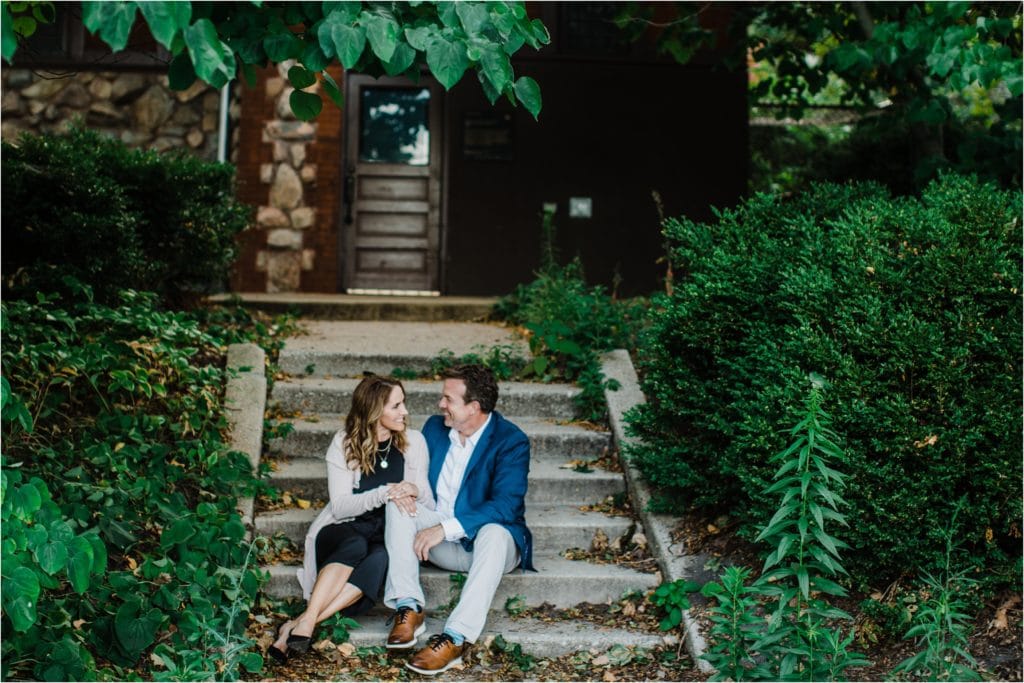couple siting on the stairs at Lincoln Park by Cafe Bauer