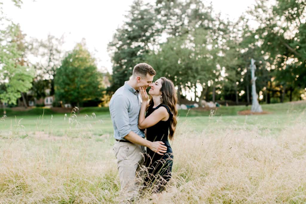 couple kissing, sunset engagement session