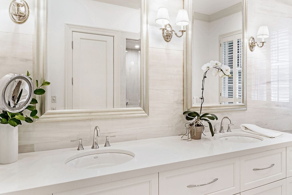 side angle of the master bathroom and two sinks