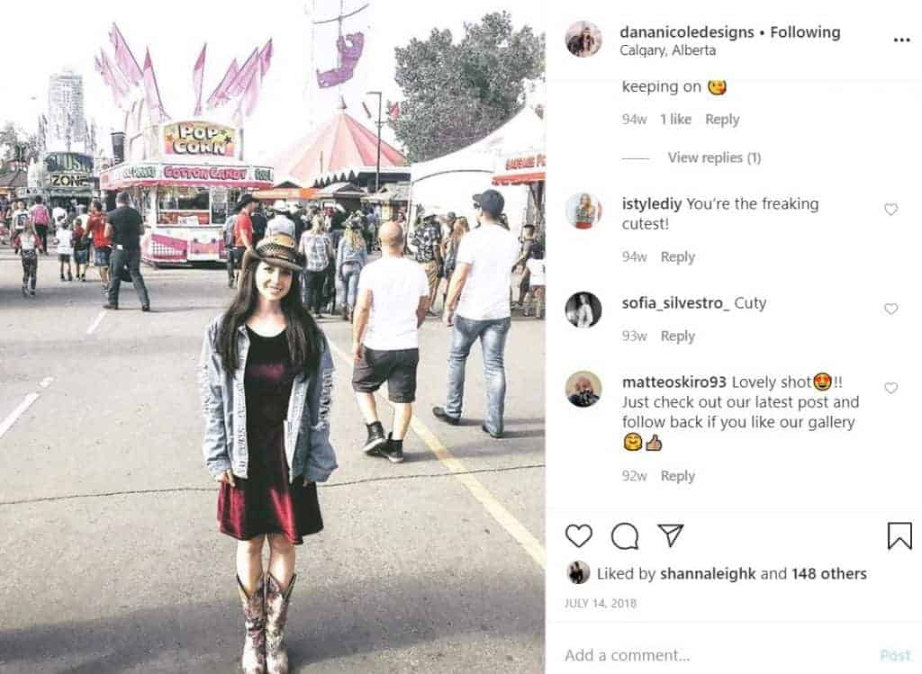 Screenshot of an Instagram image of a girl wearing a dress and a cowboy hat at an outdoor fair