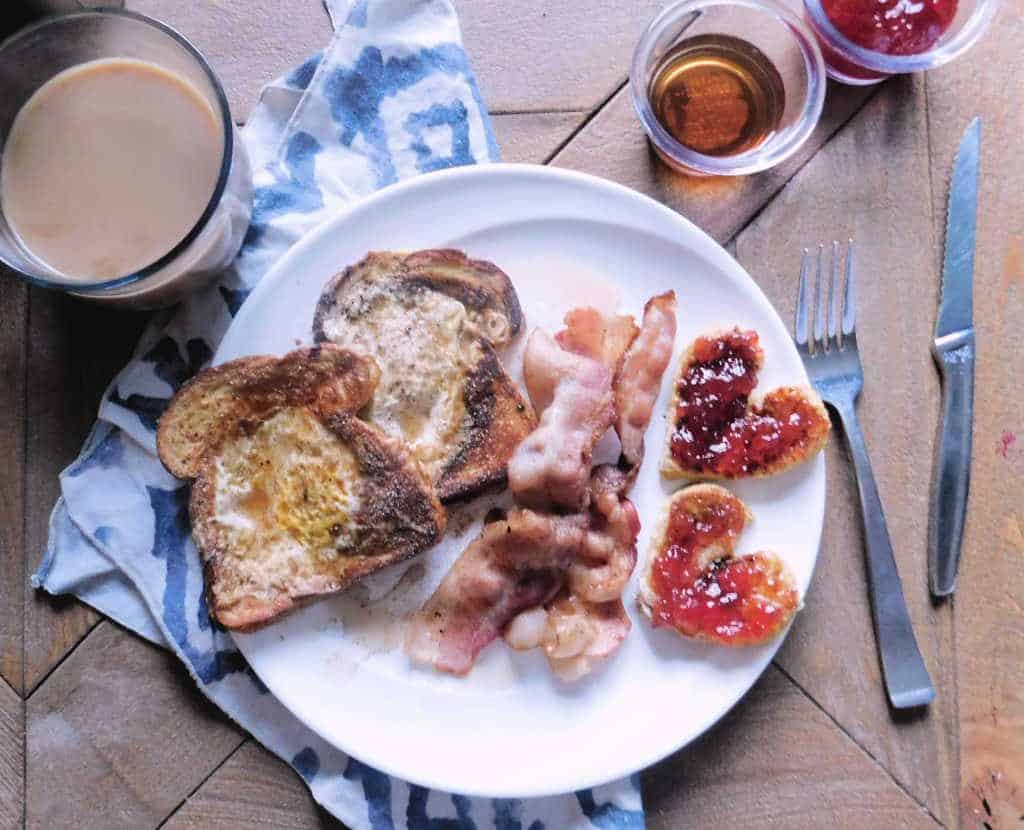 heart attack french toast on plate with bacon