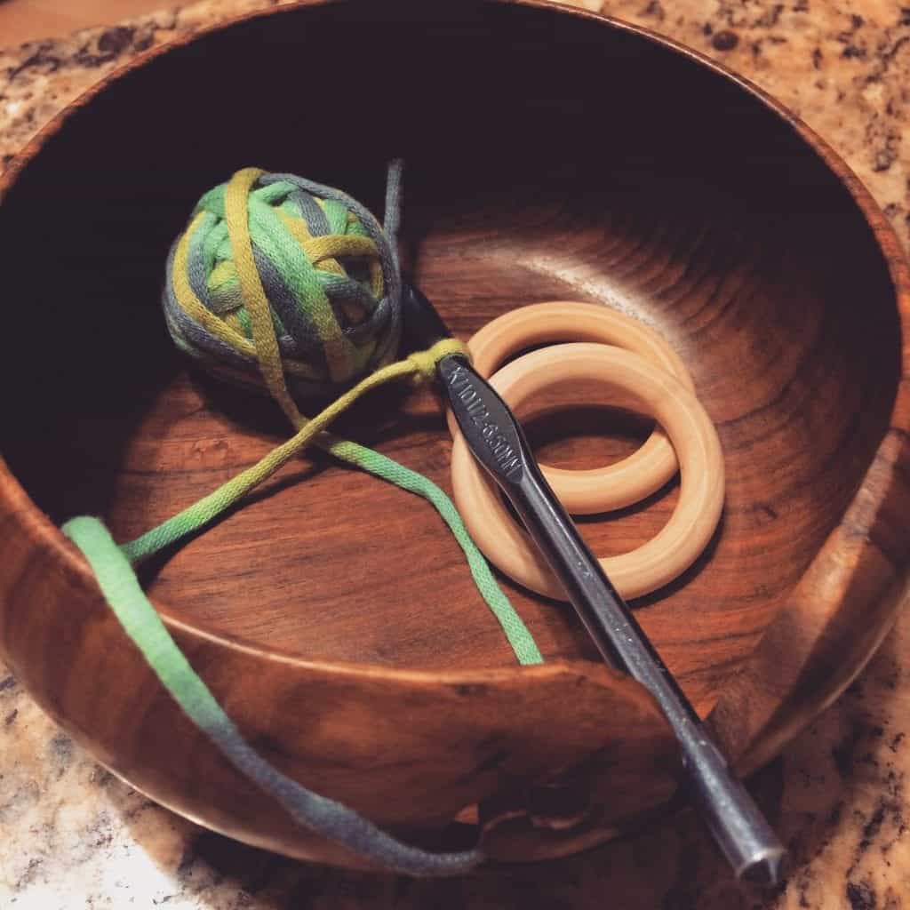 picture of small yarn ball in wood bowl