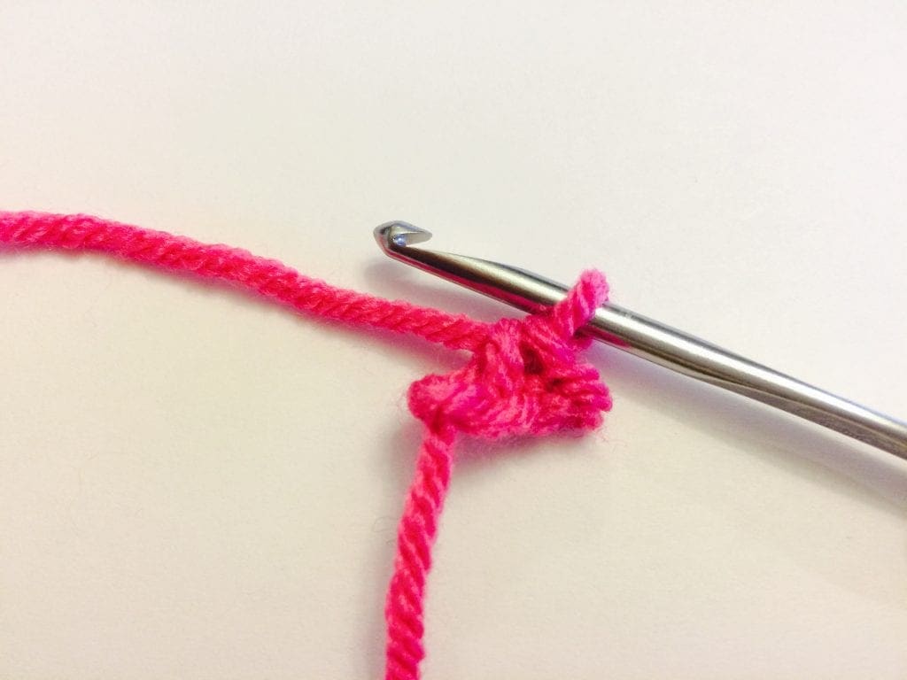 picture of tutorial single crochet pink yarn hook