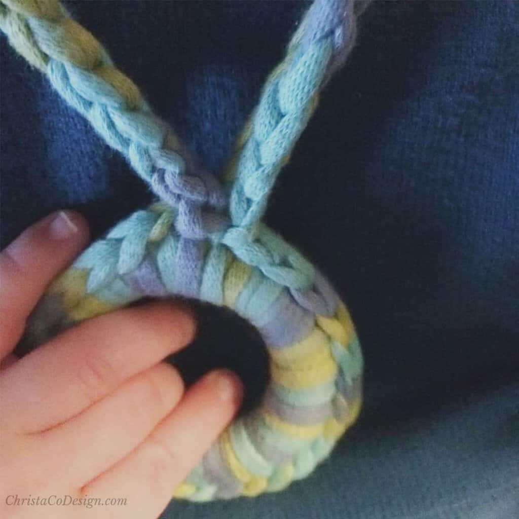 picture of baby hand on nursing necklace
