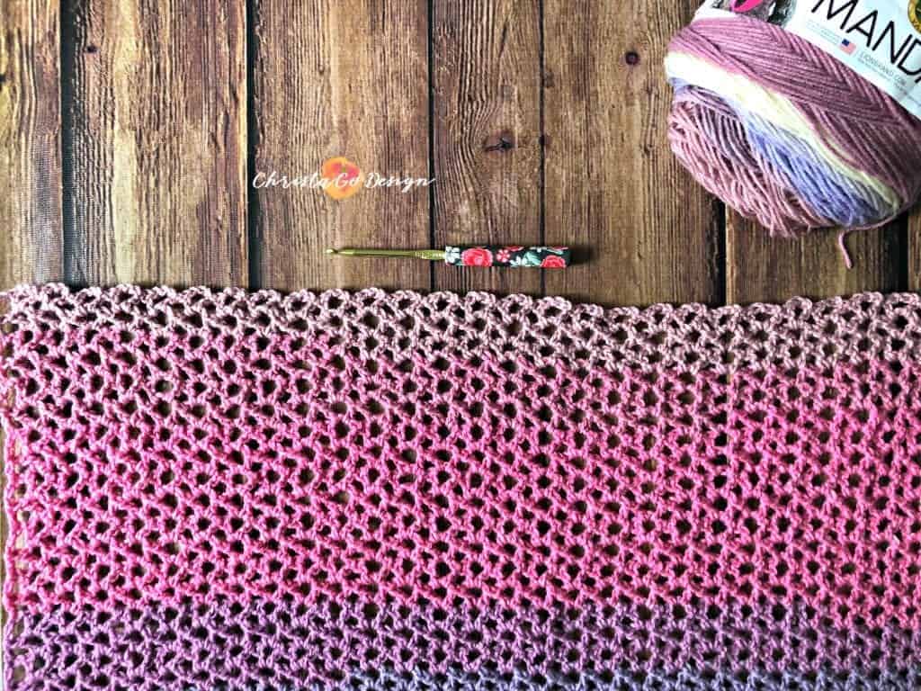 picture of self striping purple to pink crochet lace poncho flat