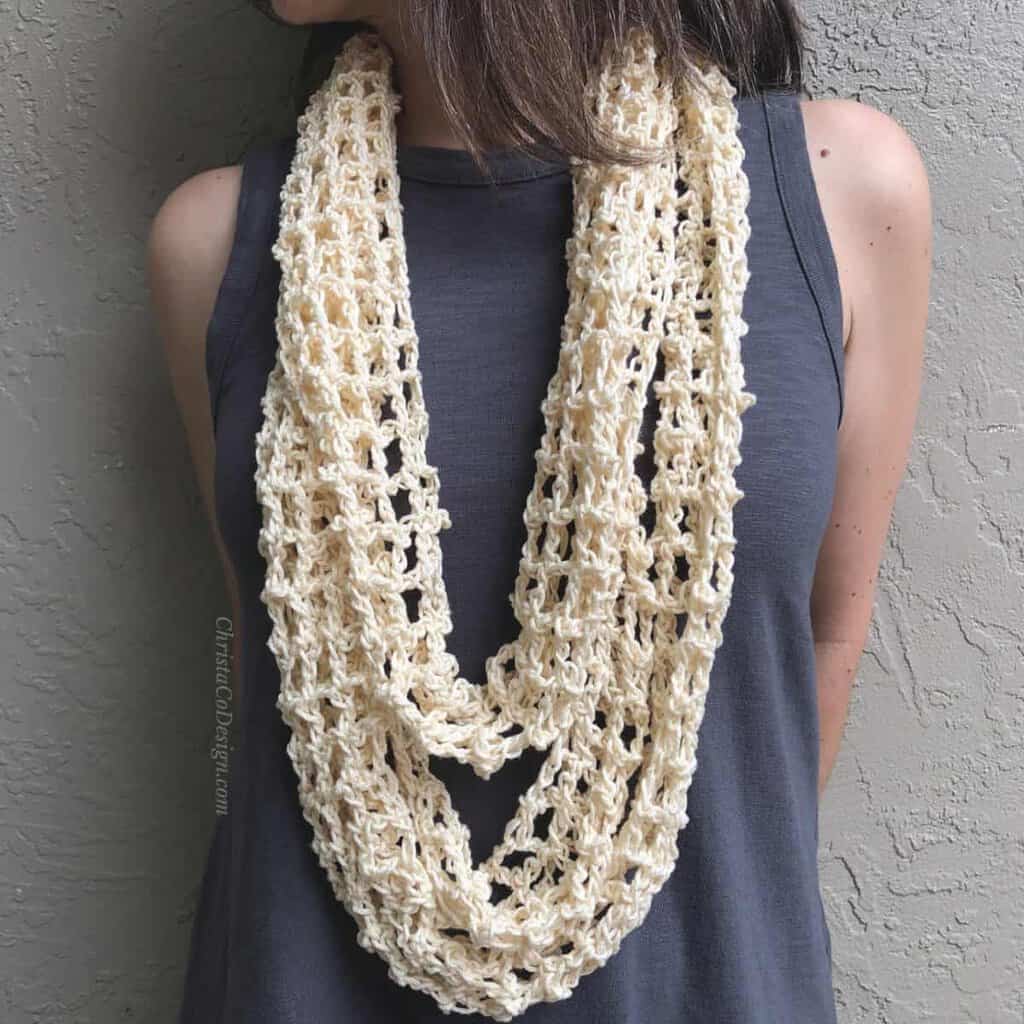 picture of woman wearing cream infinity cowl