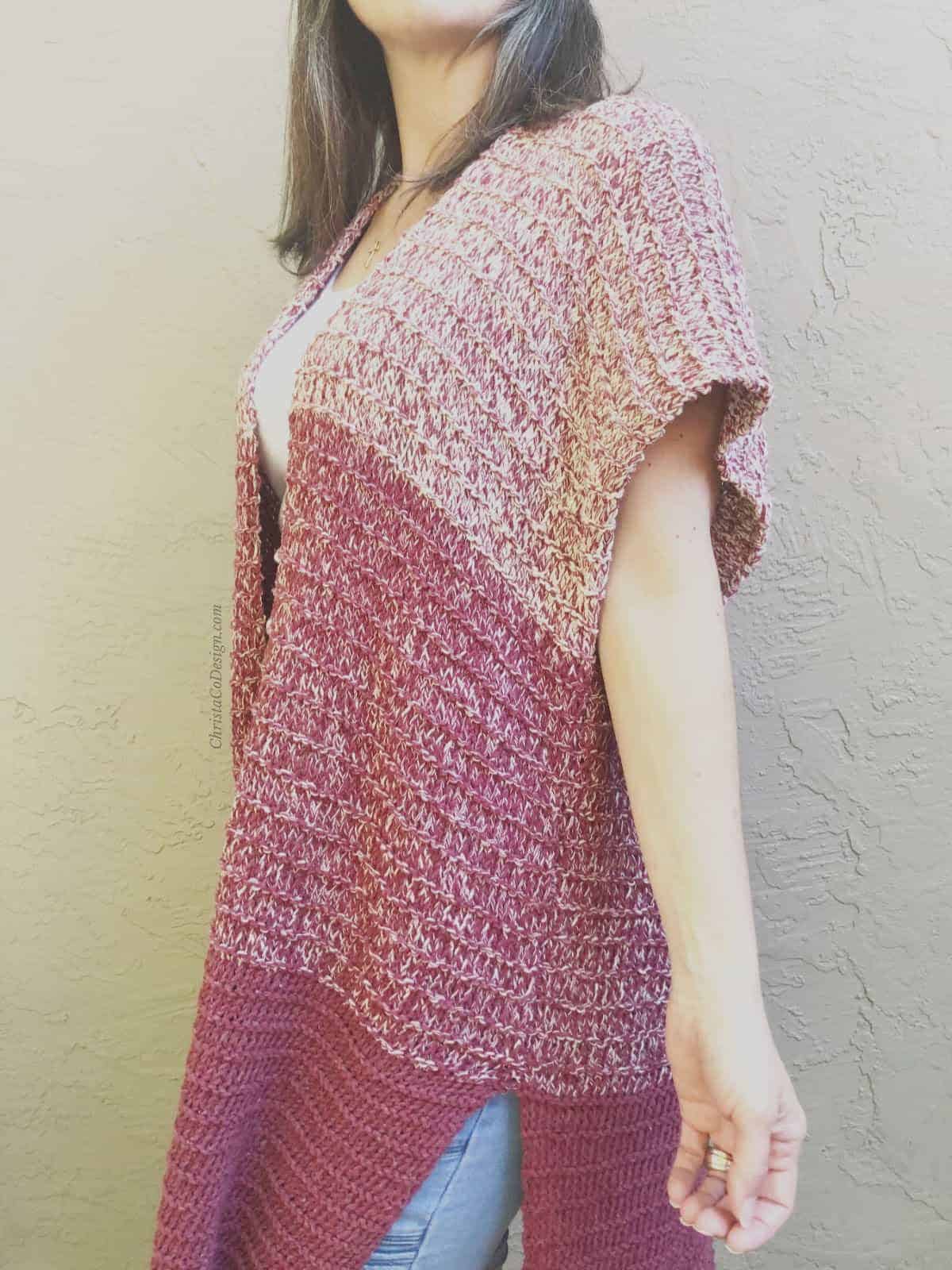 picture of woman in striped maroon ombre loose simple knit cardigan