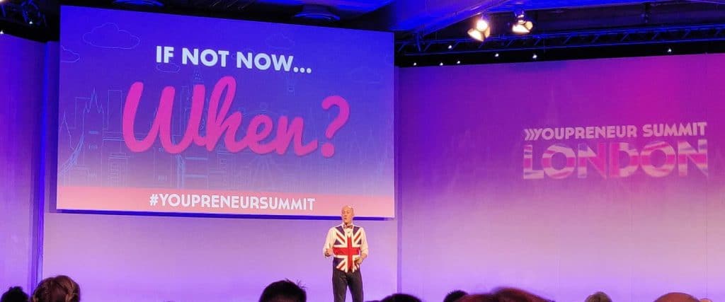 Chris Ducker on stage at the Youpreneur Summit